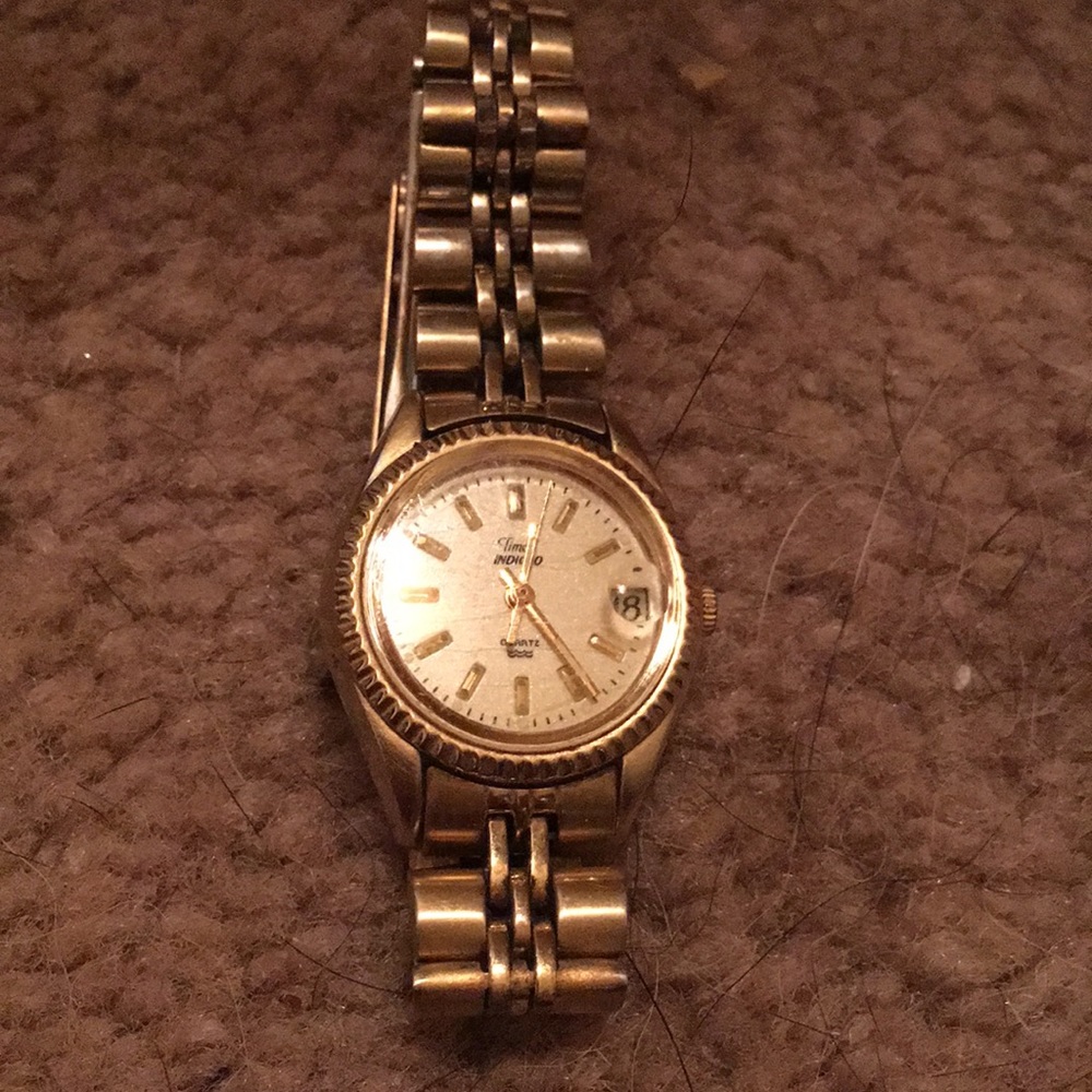 Gold watch sako